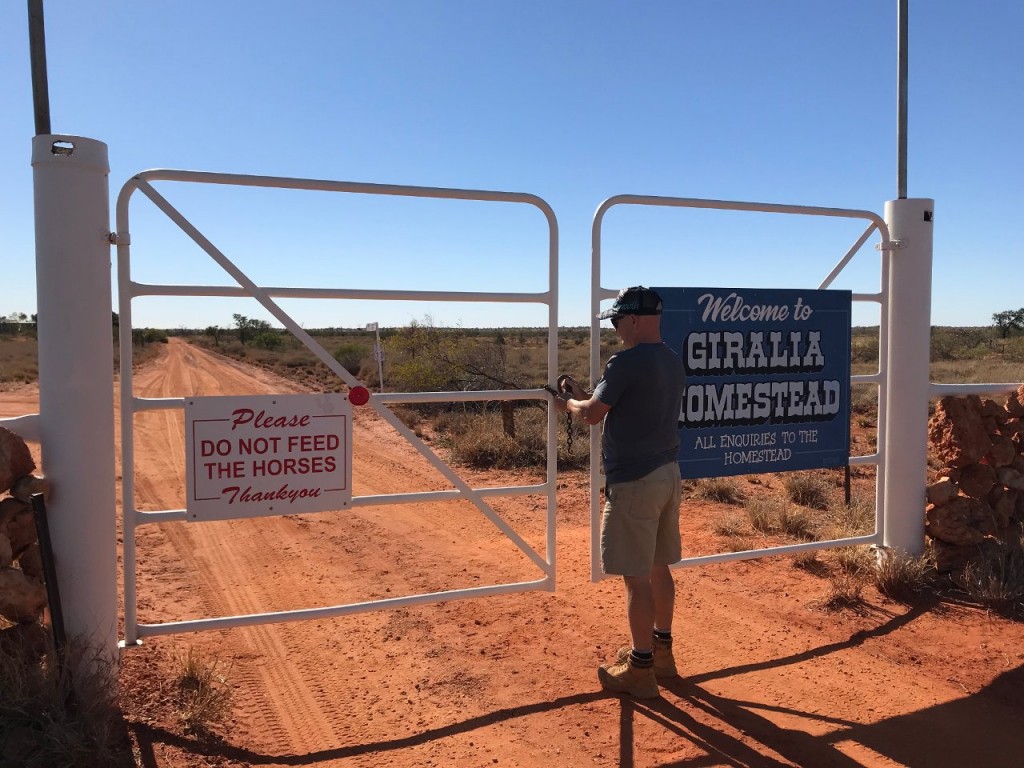 Col closing the gate for the last time at Giralia Station WA